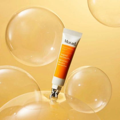 murad vitamin C cream by a yellow background