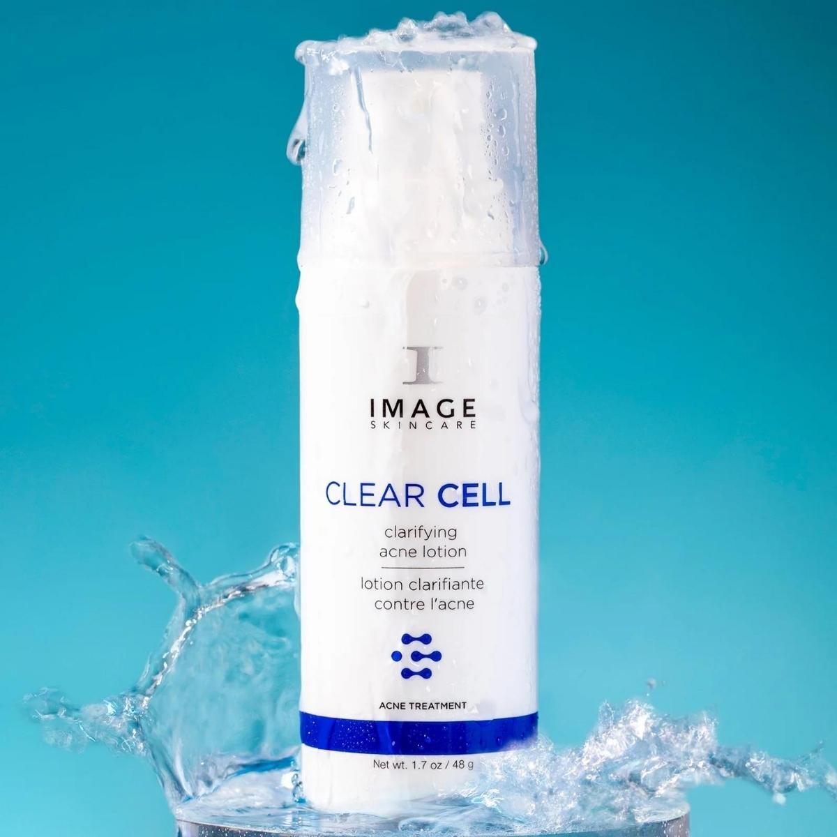 IMAGE Skincare Clear Cell Clarifying Acne Lotion product with water splashing 