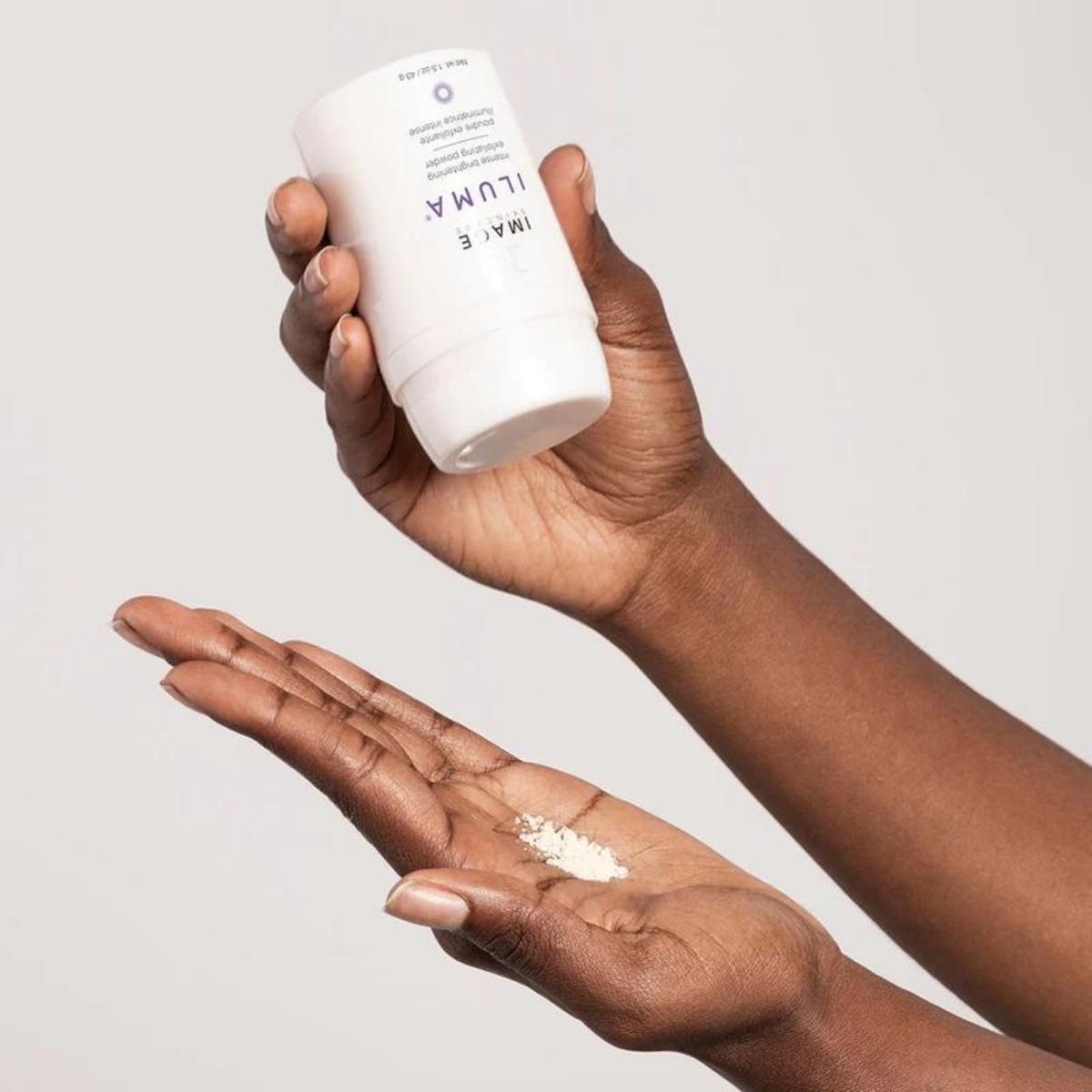 IMAGE Skincare Iluma Intense Brightening Exfoliating Powder on hands 