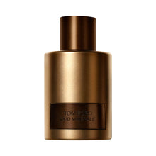Tom Ford Oud Minerale Eau De Parfum 100ml in a metallic gold and bronze bottle