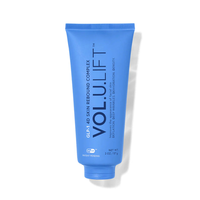 Blue tube of Vol.U.Lift skincare product on a white background