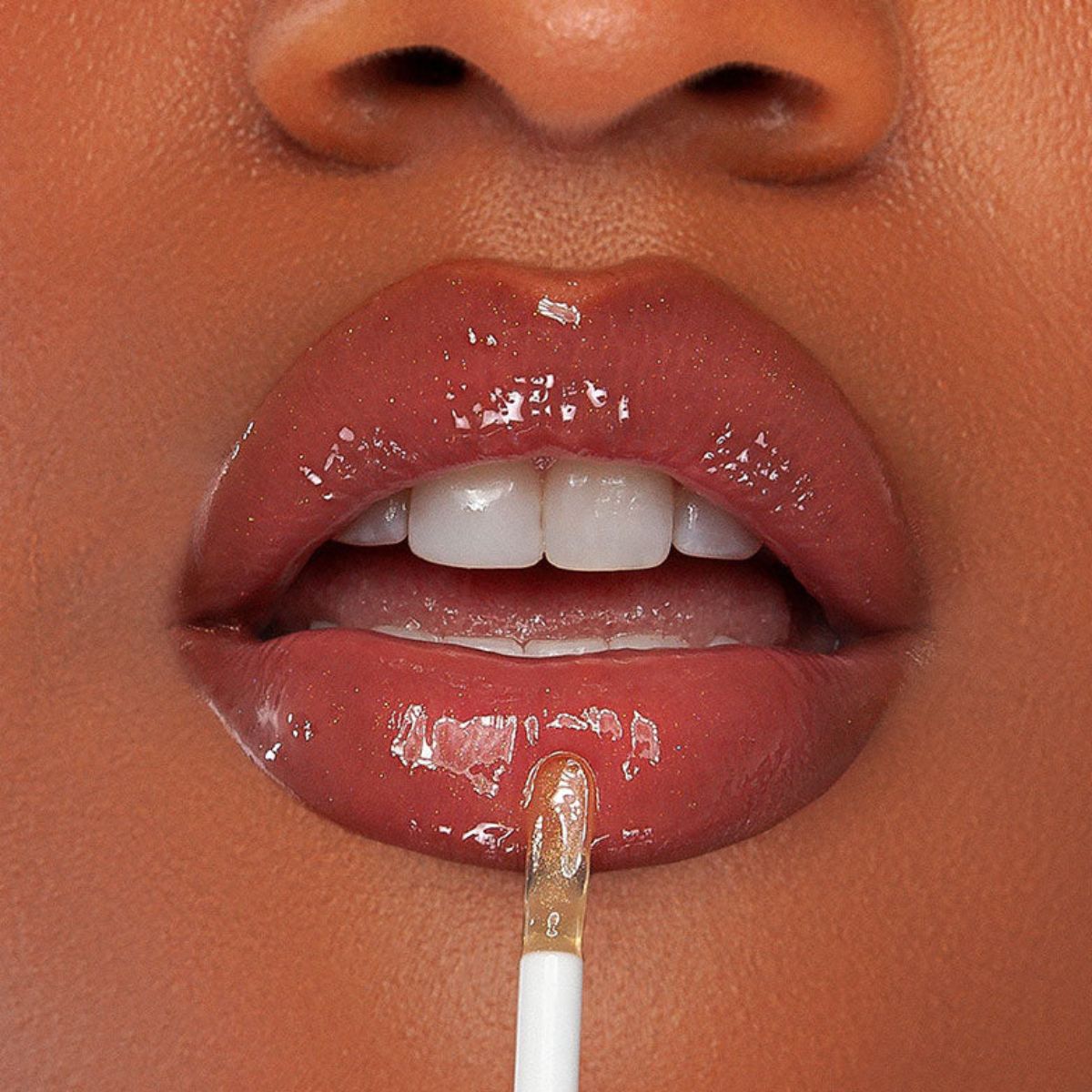 shimmering nude gloss from kash beauty