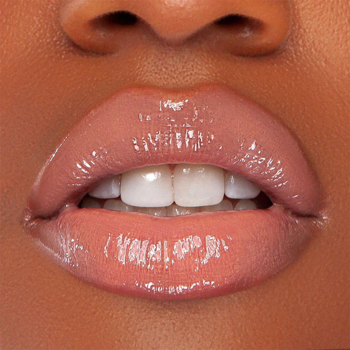 fuller lips with nude  lip gloss